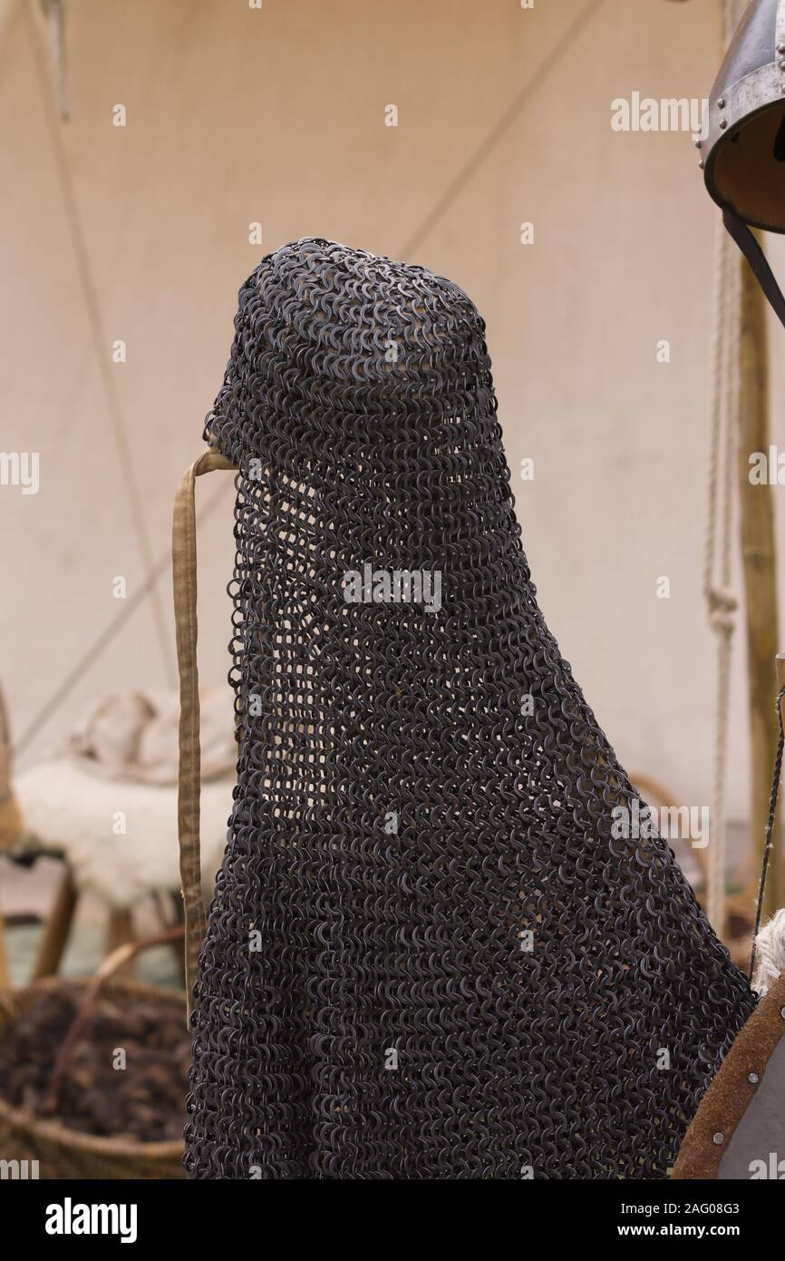 Medieval chainmail or mail coif or neck guard worn to protect the wearers head and neck in combat Stock Photo