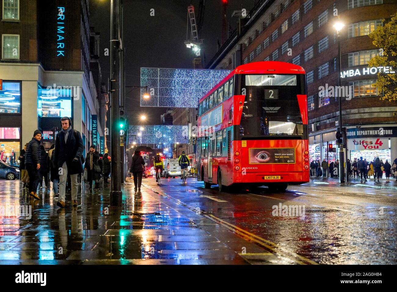 Red double decker bus, Oxford Street, night, London, England, UK Stock Photo