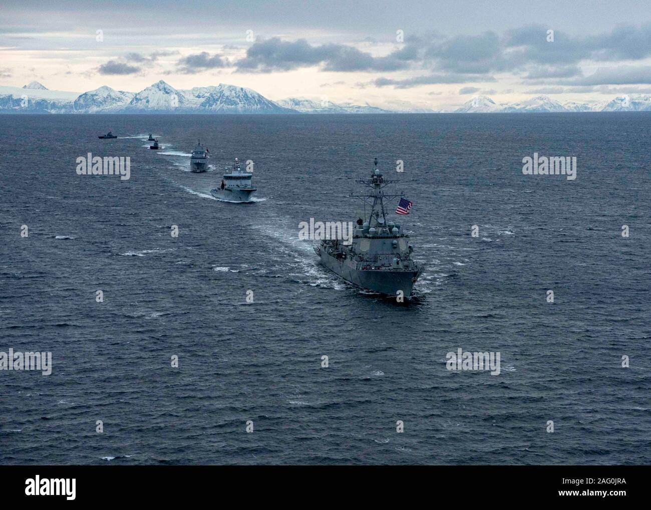 U.S. Navy Arleigh Burke-class guided-missile destroyer USS Gridley leads a formation of NATO allied ships participating in the Royal Norwegian Navy led exercise FLOTEX 19 November 24, 2019 in the Norwegian Sea. Stock Photo