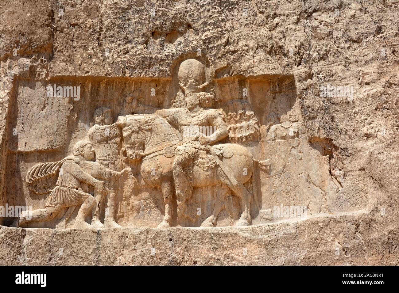 The triumph of Emperor Shapur I  over the Roman Emperors Valerian and Philip the Arab. Naqsh-e-Rostam, Iran Stock Photo