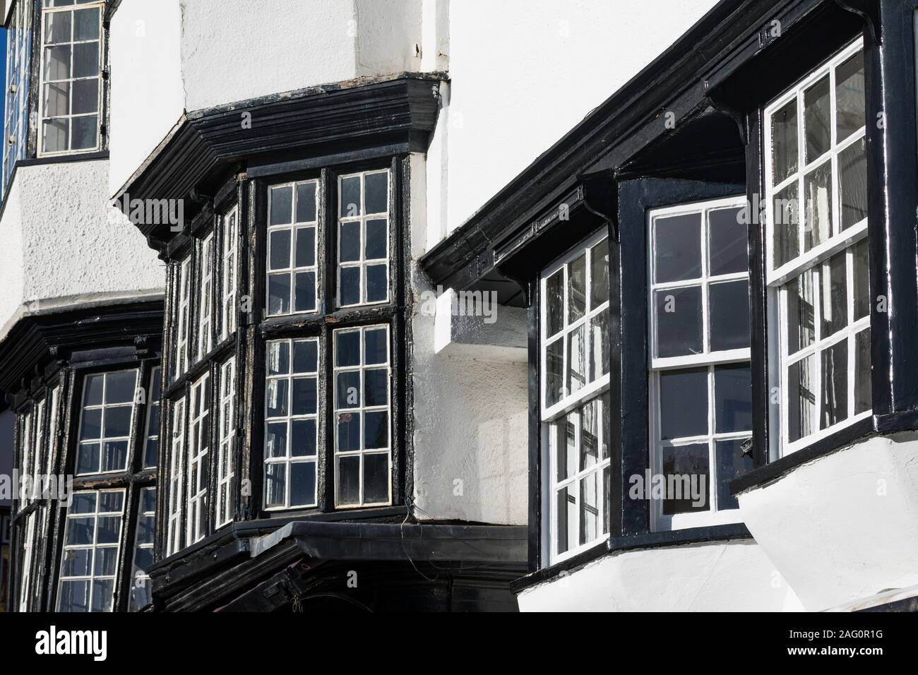 Detail of the Windows and Upper Stories of Mol's Coffee House (1596), Cathedral Close, Exeter, Devon. Stock Photo