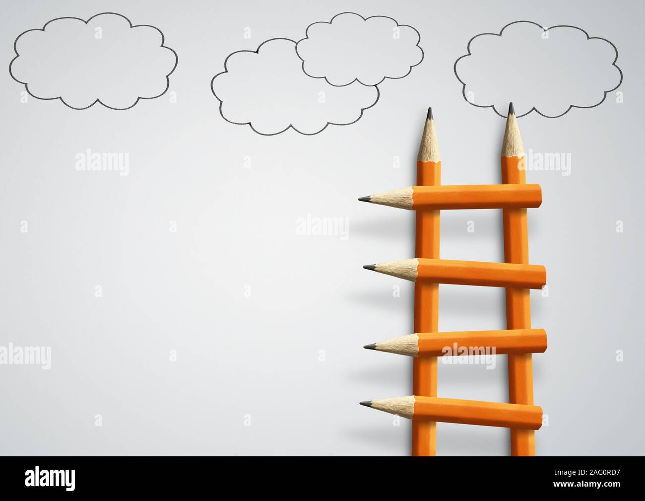 Steps to success concept, pencil ladder with clouds and copy space Stock Photo