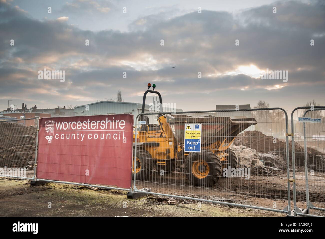 Industrial landscape view of a UK building site on a cold, misty, frosty, winter morning in December. Stock Photo