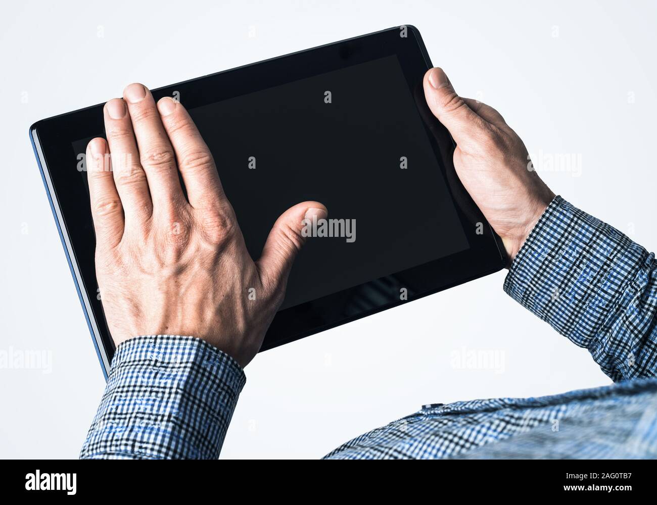 Hands of businessman holding tablet pc with black screen Stock Photo ...