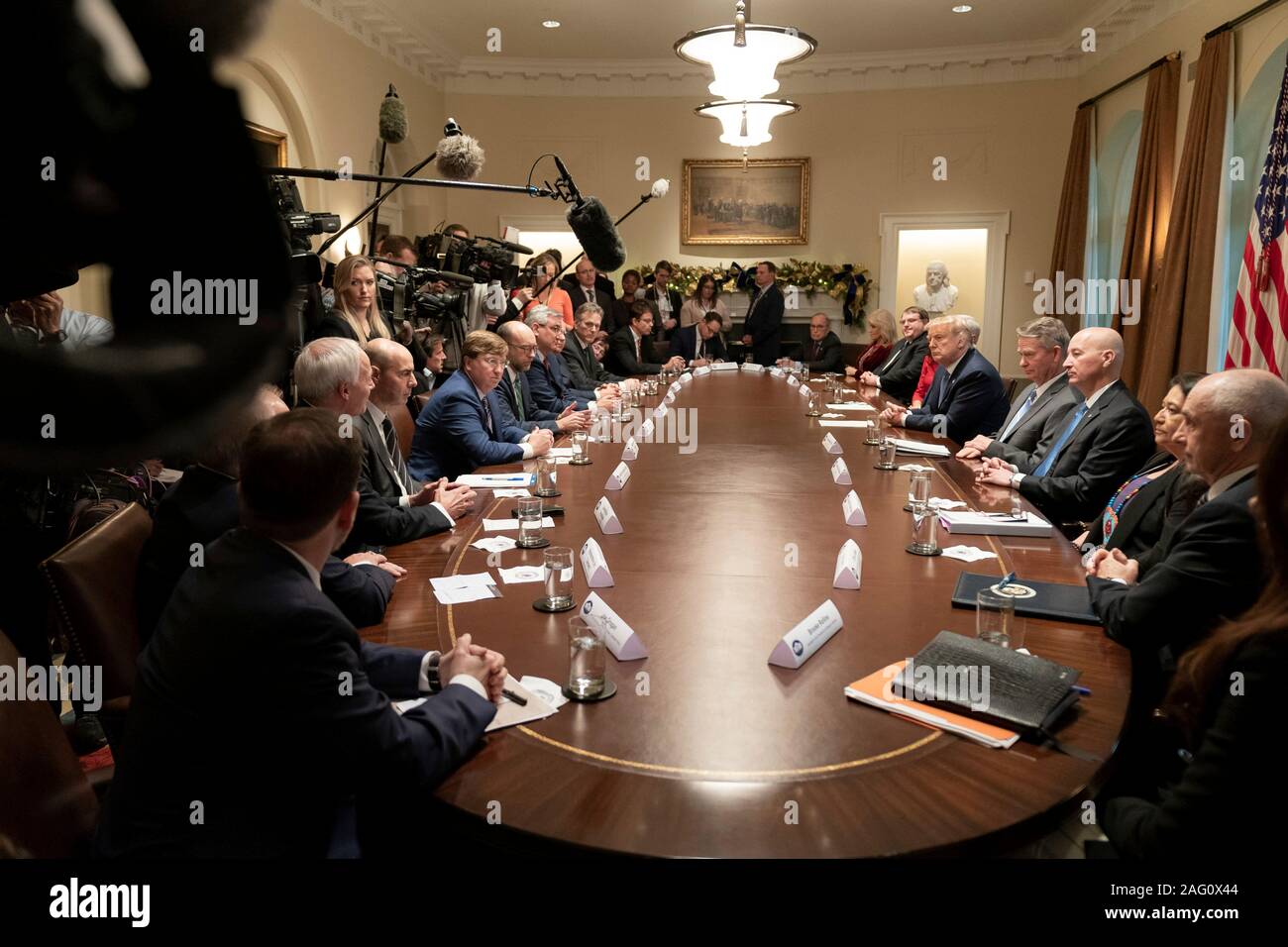 Washington, United States of America. 16 December, 2019. U.S President Donald Trump and Vice President Mike Pence host a roundtable on on the Governors Initiative on Regulatory Innovation in the Cabinet Room of the White House December 16, 2019 in Washington, DC.  Credit: Tia Dufour/White House Photo/Alamy Live News Stock Photo