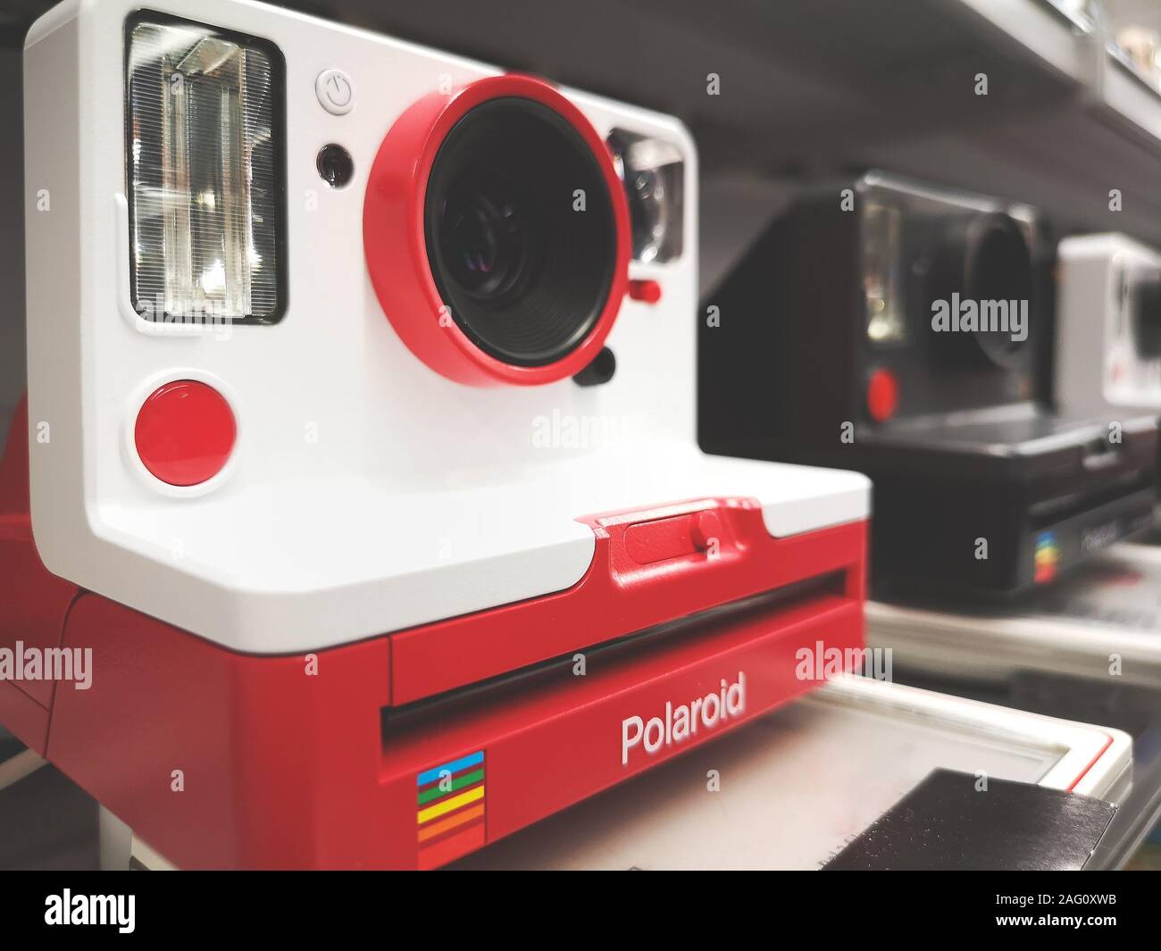 red Polaroid instant camera iconic eighties design object Stock Photo -  Alamy