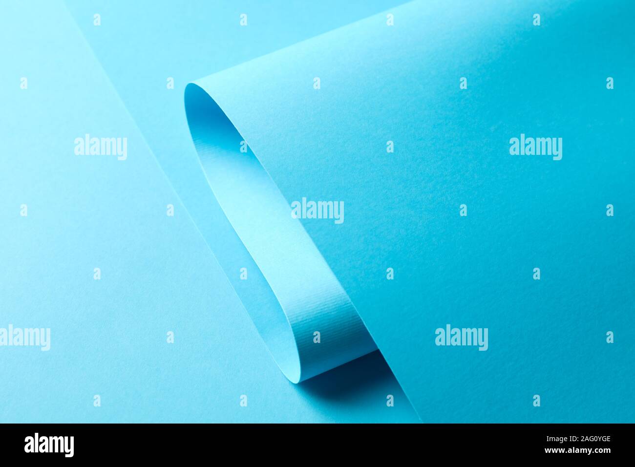 Blue sheet on color background, close up Stock Photo Alamy