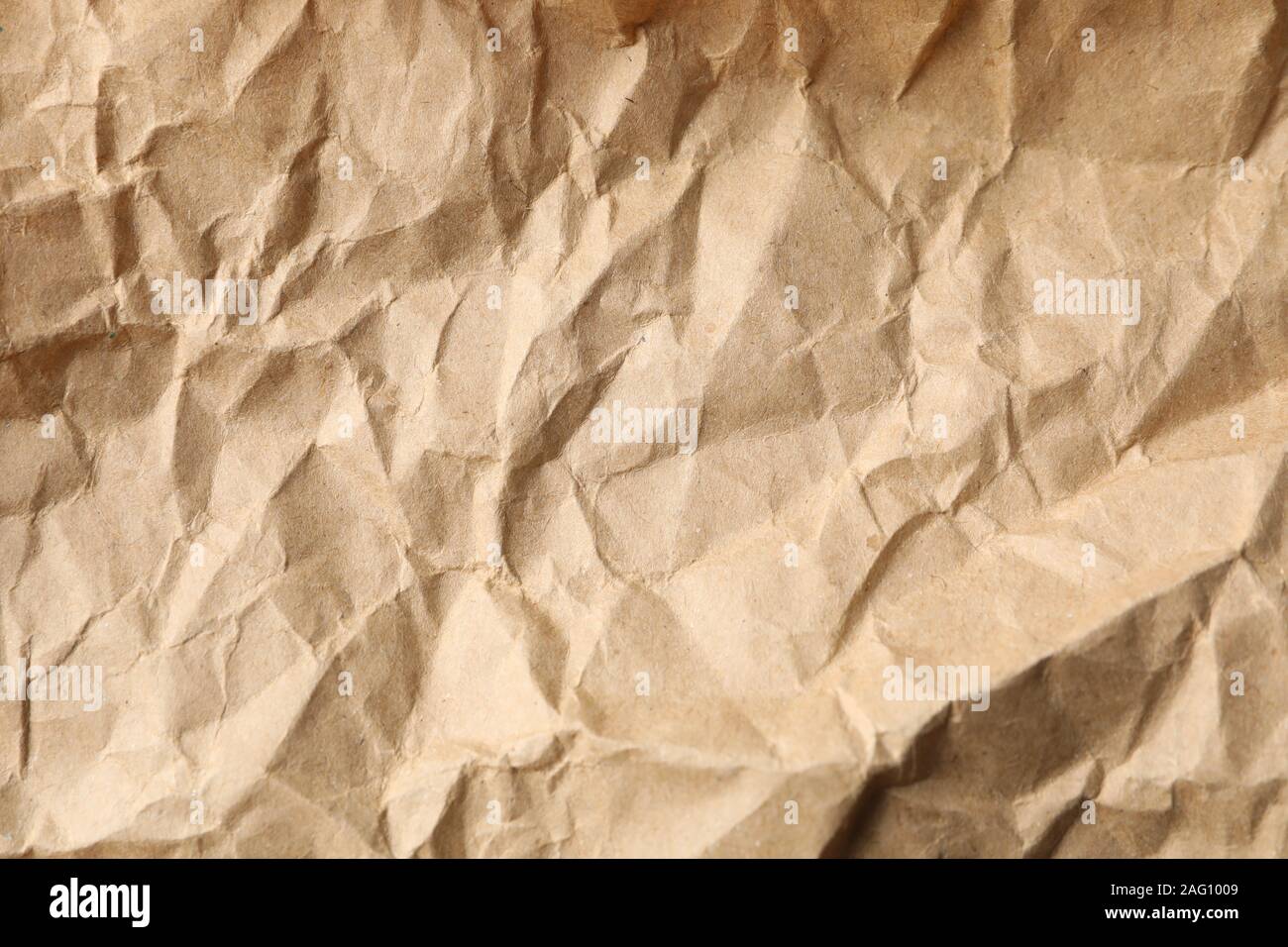 Close up crumpled craft paper texture and background with copy