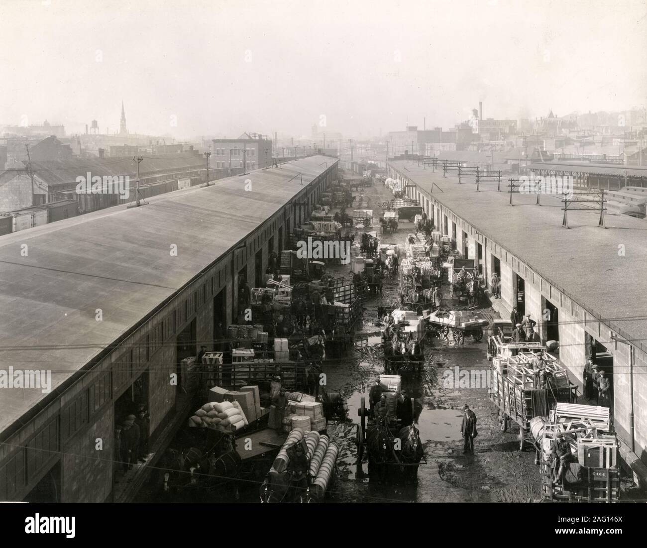 Early 20th century vintage press photograph warehouses and goods in a