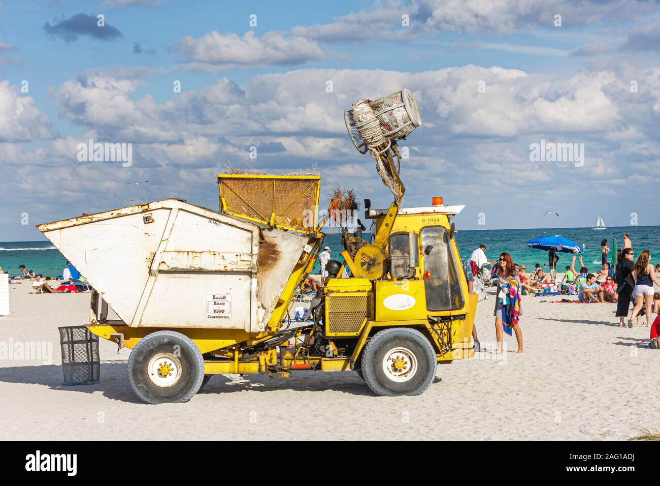 Miami Beach Florida,Atlantic Ocean,water,trash collection,garbage truck,FL100405060 Stock Photo