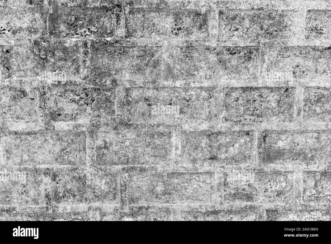 Black and white background of ancient stone wall. Texture of old brick ...