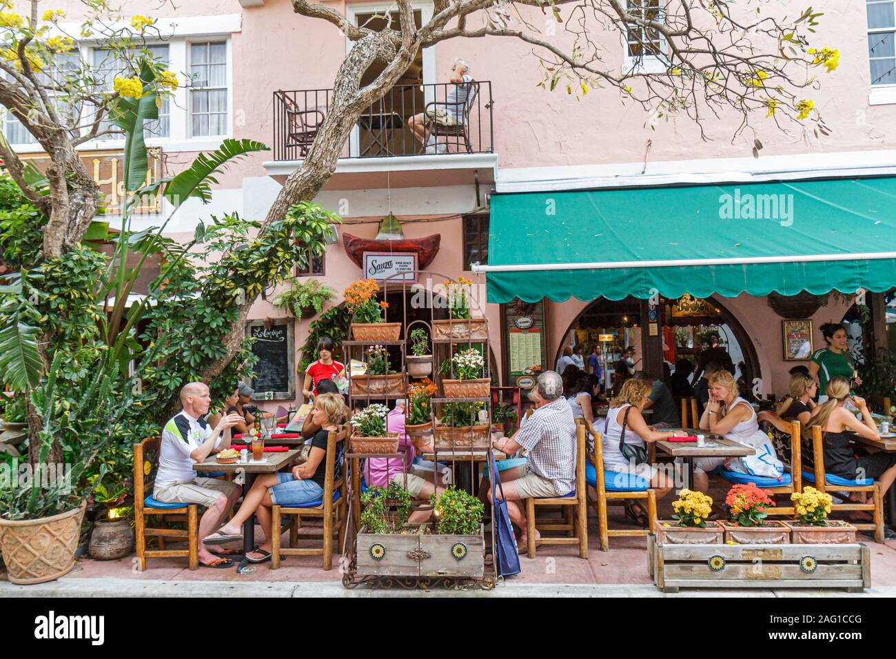 Miami Beach Florida,Espanola Way,restaurant restaurants food dining eating out cafe cafes bistro,al fresco sidewalk outside open air tables,dining,vis Stock Photo