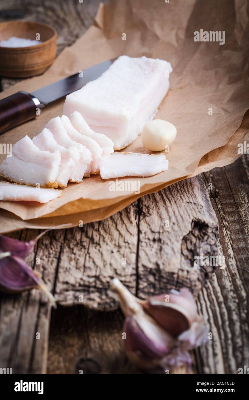 Traditional Ukrainian appetizer, raw lard with garlic and salt on