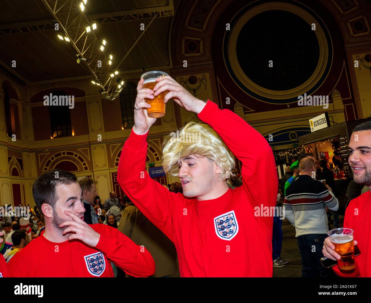 Darts fans wear 1966 England football kit in the Fans Villlage at