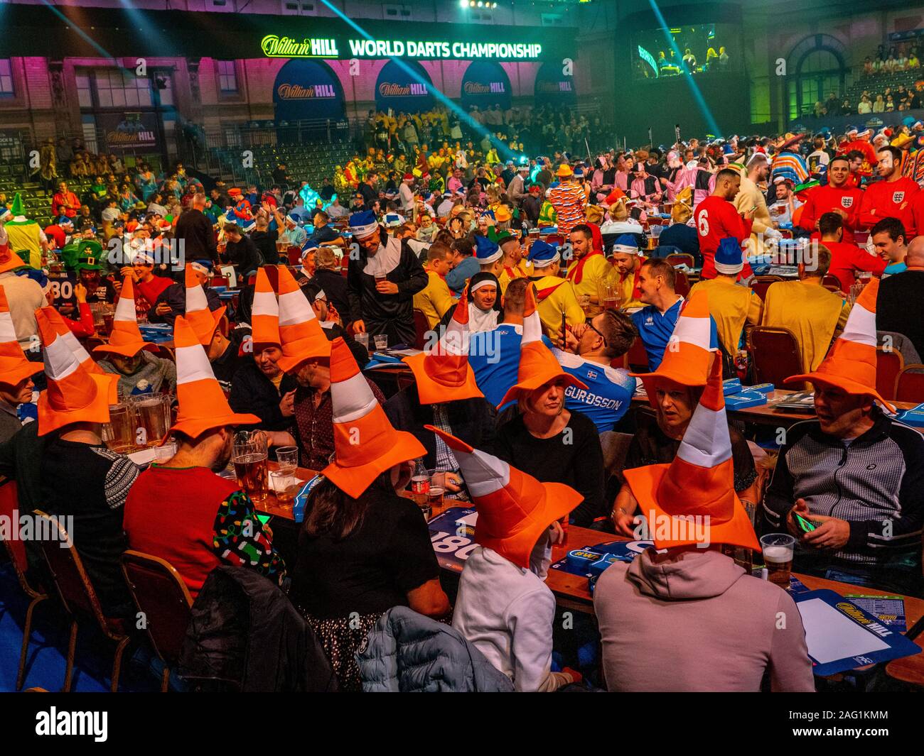 Darts fans wear fancy dress in the competition arena at Alexandra Palace on December 13, 2019 in London, England Stock Photo - Alamy