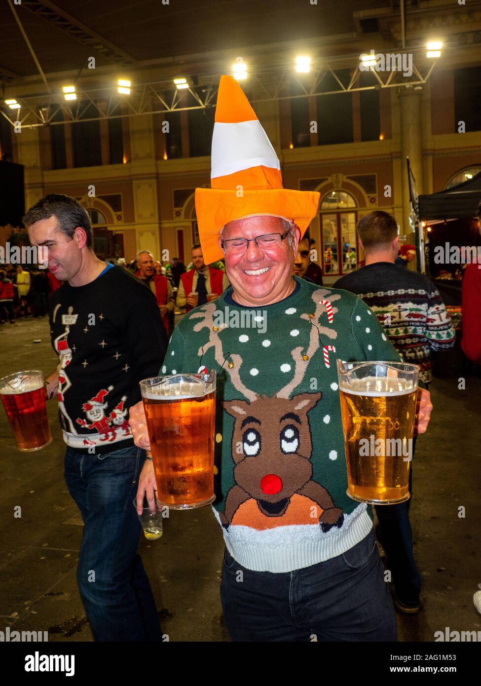 A darts fan collects beer in the Fans Villlage at Alexandra Palace on  December 13, 2019 in London, England Stock Photo - Alamy