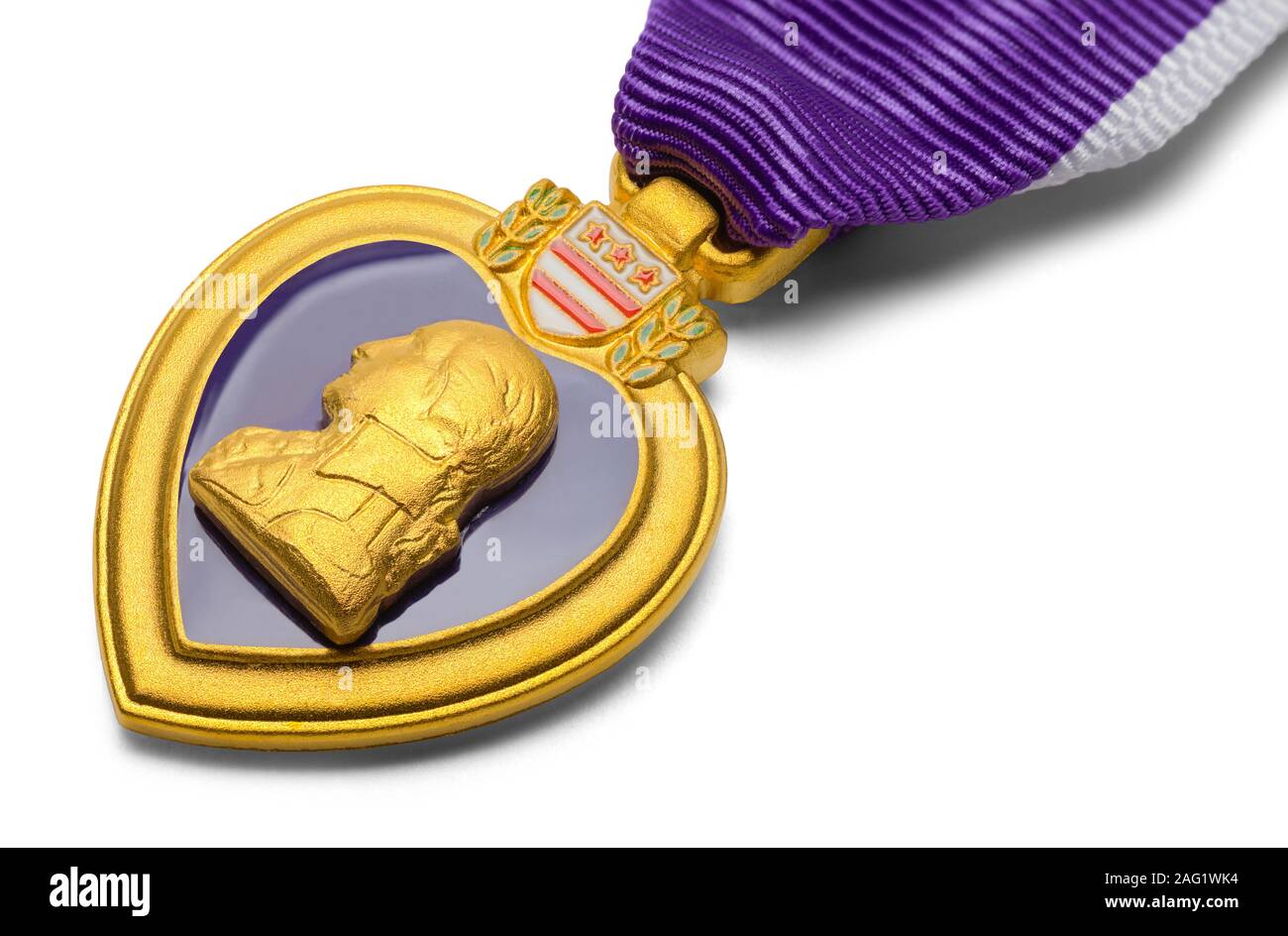 Close Up of Purple Heart Military Medal Isolated on White. Stock Photo