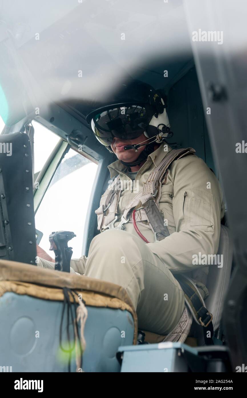 Pilot before flight in MI-8 helicopter Stock Photo - Alamy