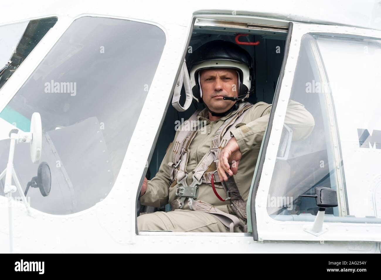 Pilot before flight in MI-8 helicopter Stock Photo - Alamy