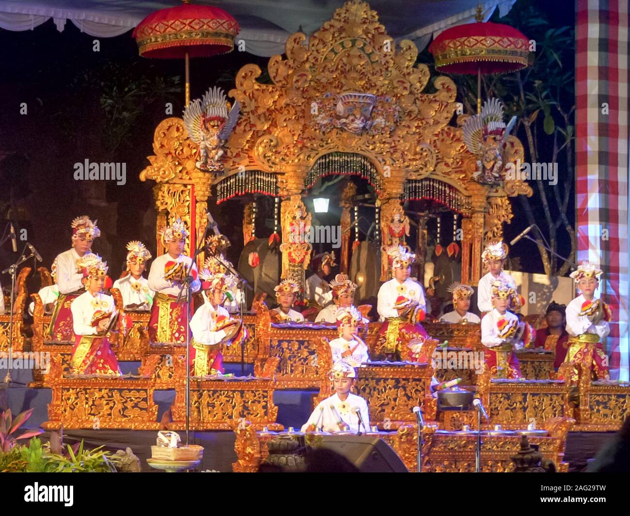 KUTA, INDONESIA - MARCH, 18, 2018: children's gamelan band performs for new year at kuta beach on bali Stock Photo