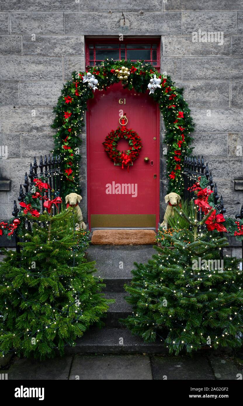 Christmas decorated doorway on the High Street, North Queensferry near Edinburgh, Scotland, United Kingdom Stock Photo