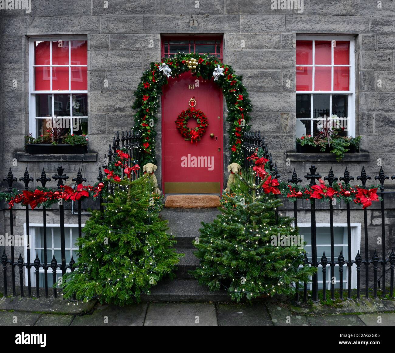 Christmas decorated doorway on the High Street, North Queensferry near Edinburgh, Scotland, United Kingdom Stock Photo
