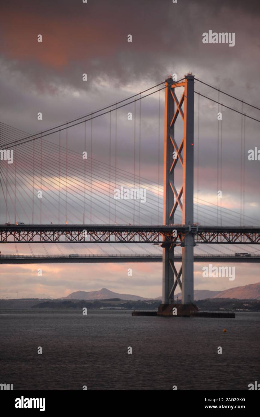 The Forth Road Bridge with The Queensferry Crossing behind Stock Photo