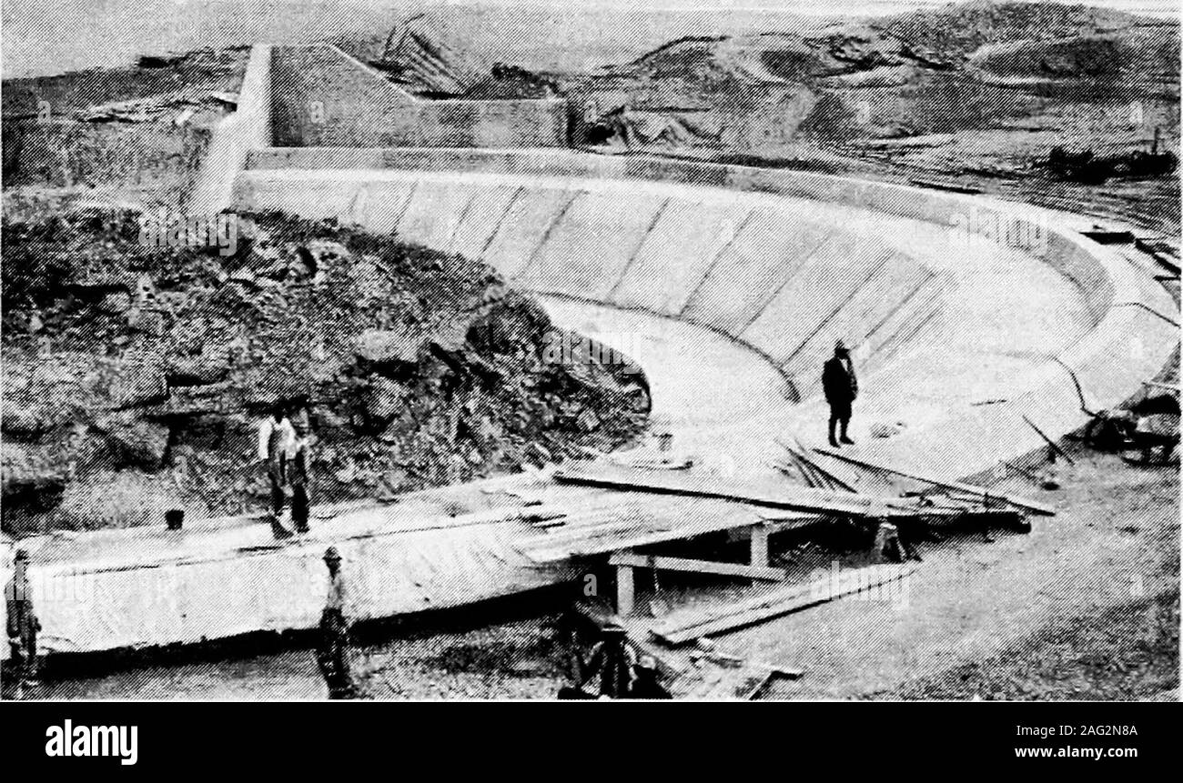 . Principles of irrigation engineering, arid lands, water supply, storage works, dams, canals, water rights and products. Fig. C.—Spillway with effective lengths increased by curved outlines. Orland Project, Colo.. Fig. D.—Spillway for earth dam. Belle Fourche Project, So. Dak. OUTLET WORKS 253 sand blasts and the best concrete carved into fantastic forms; onthe other hand moss may be found growing on the edge of channelswhere such velocities are obtained. The problem is largely that ofthe character of the internal motions caused by the form of theorifice. This is illustrated in the case of a Stock Photo