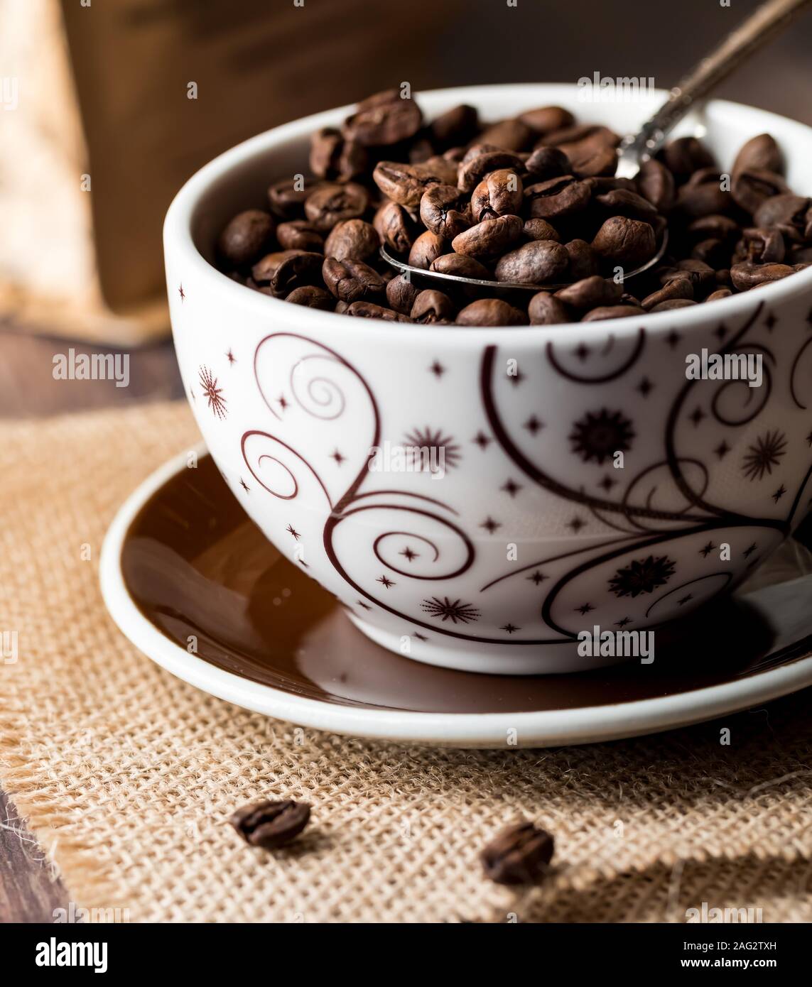 Cup full of coffee beans. Stock Photo