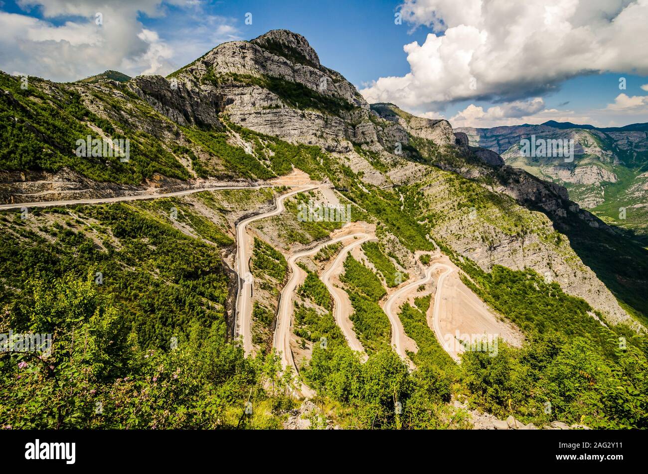 Serpentine road in Albanian mountains near Rrapsh in summer Stock Photo