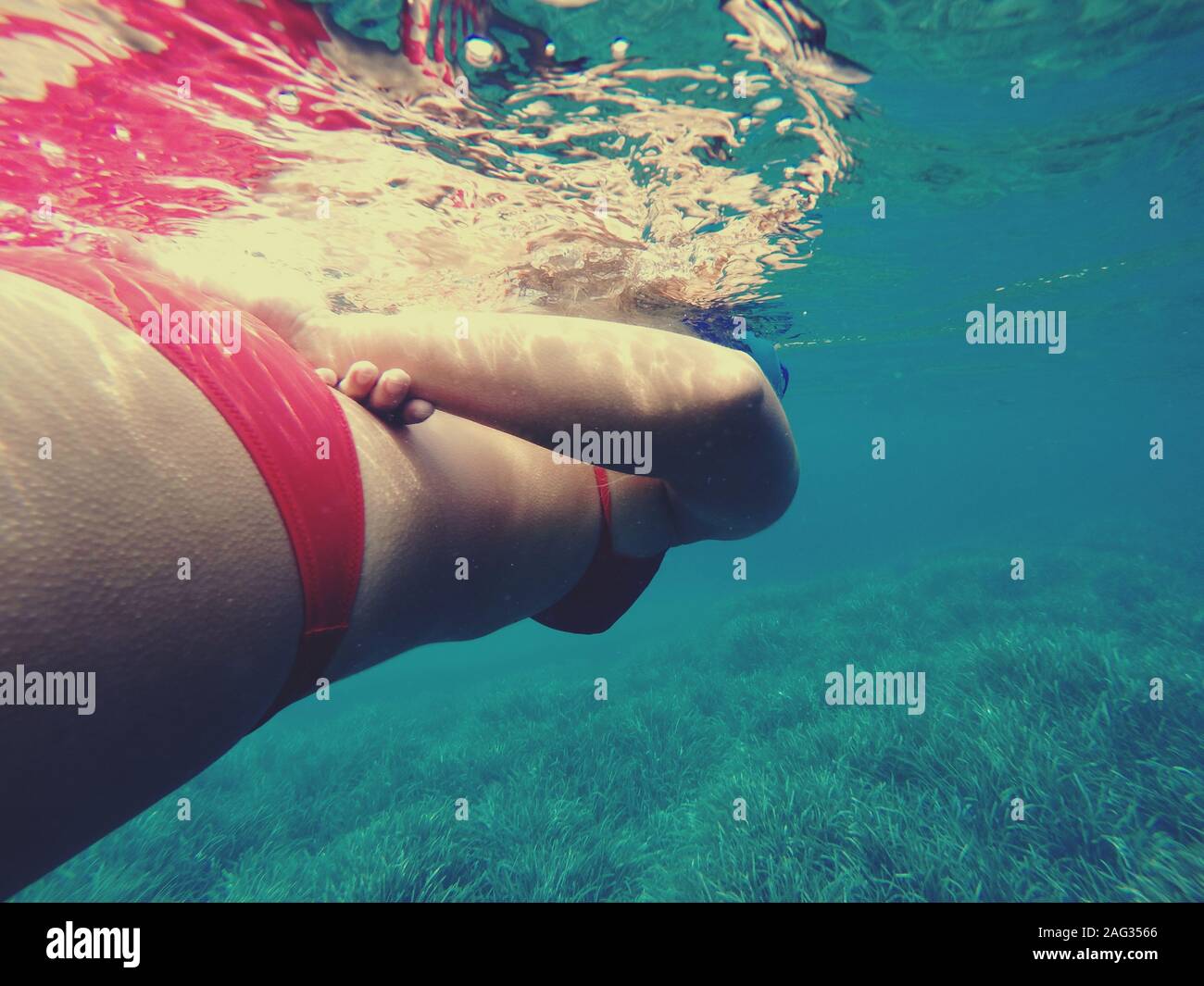 Scopello, Castellammare del Golfo, Trapani. Snorkeling in the incredible  Spiaggia dei Faraglioni Stock Photo - Alamy