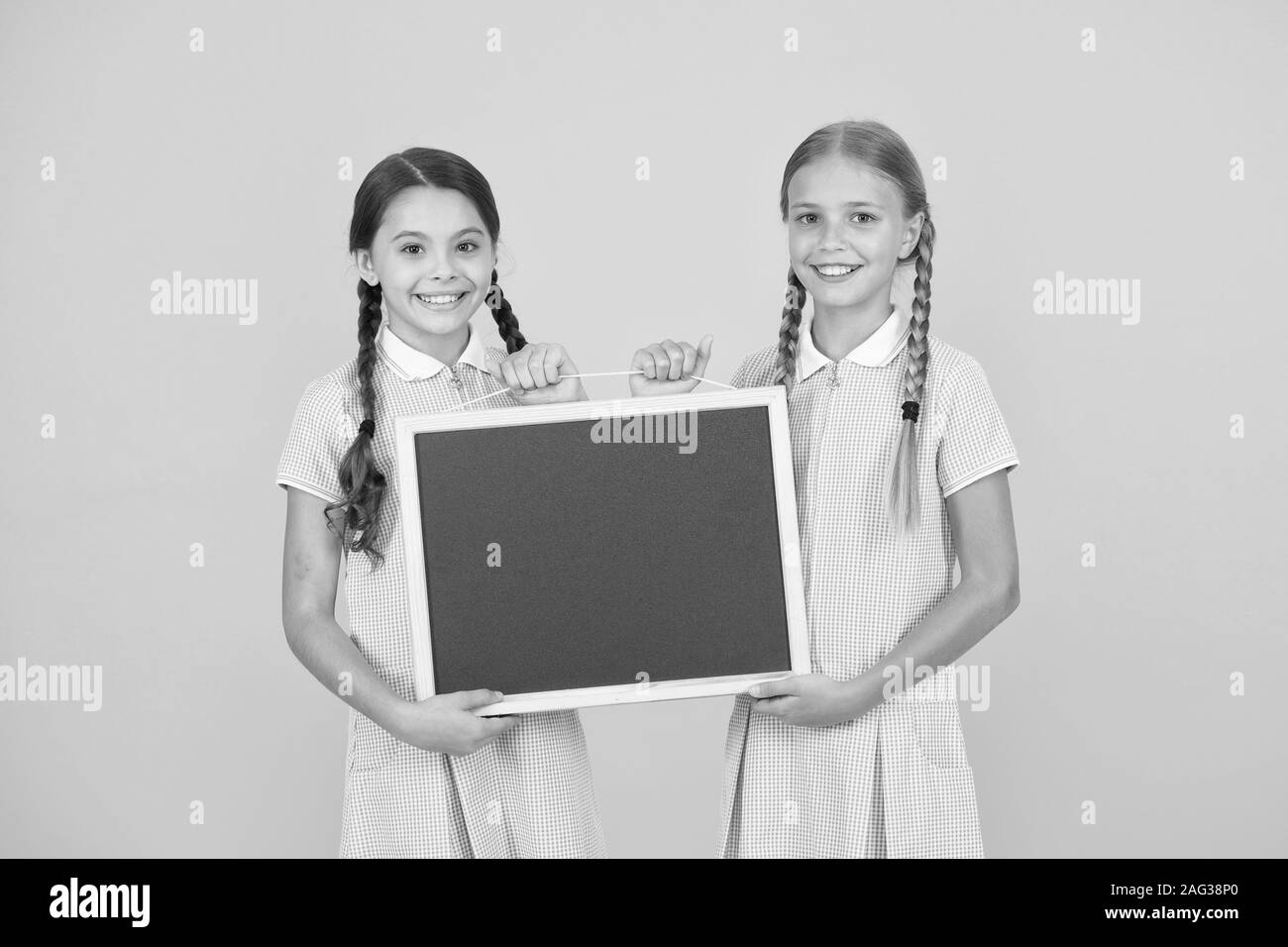 Back to school kids uniform Black and White Stock Photos & Images - Alamy