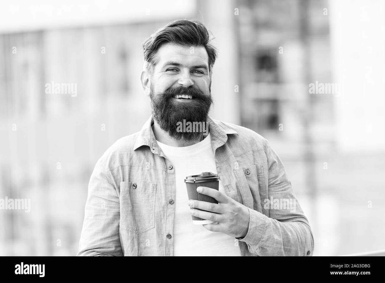 You deserve coffee break. Bearded man drink coffee during work break. Brutal hipster enjoy coffee break. Break time. Good morning mood. Happy vibes. Breakfast. Drink and food. Stock Photo