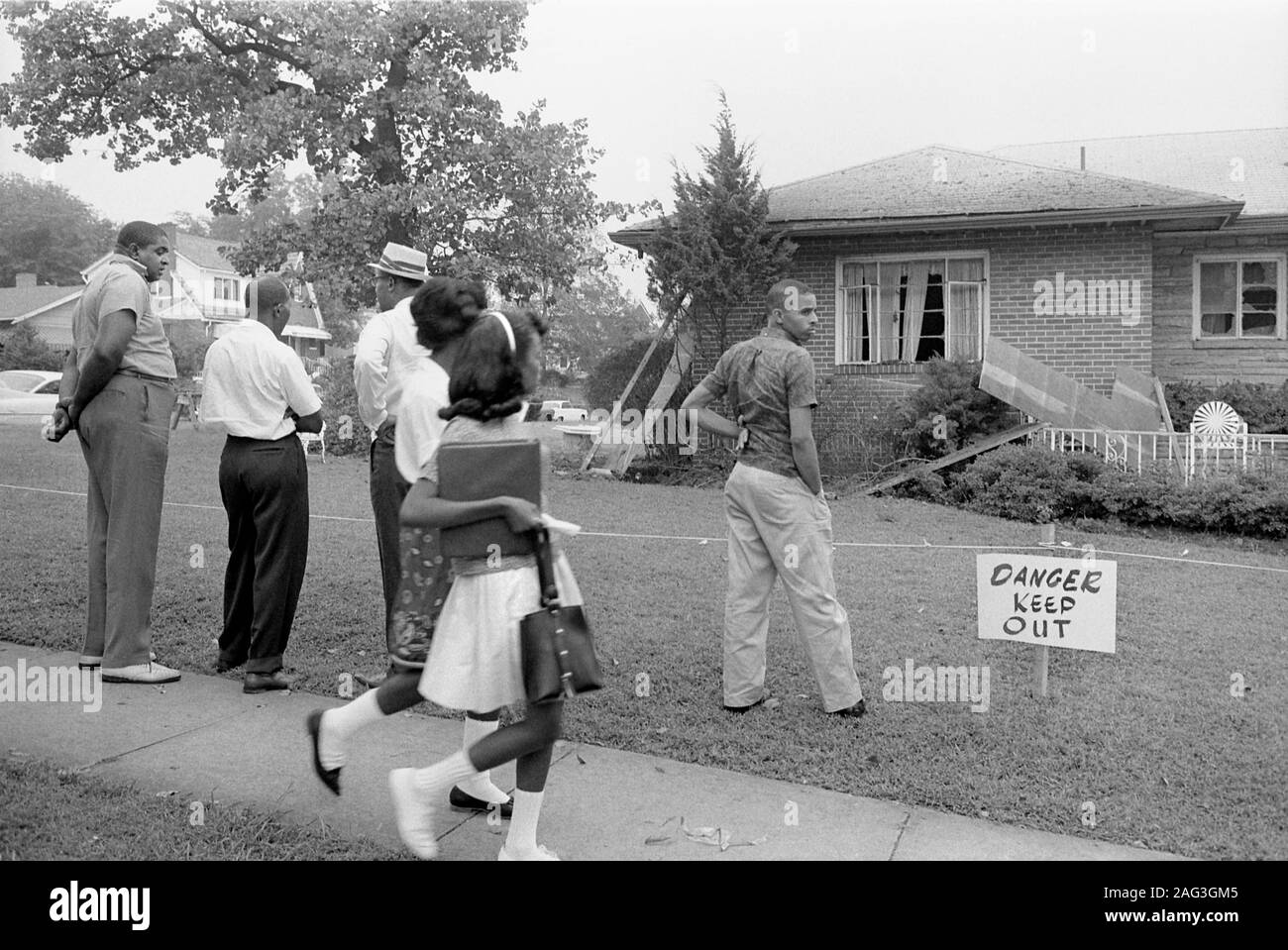 Group of African Americans viewing the Bomb-Damaged Home of Arthur Shores, NAACP Attorney, Birmingham, Alabama, USA, photograph by Marion S. Trikosko, September 5, 1963 Stock Photo