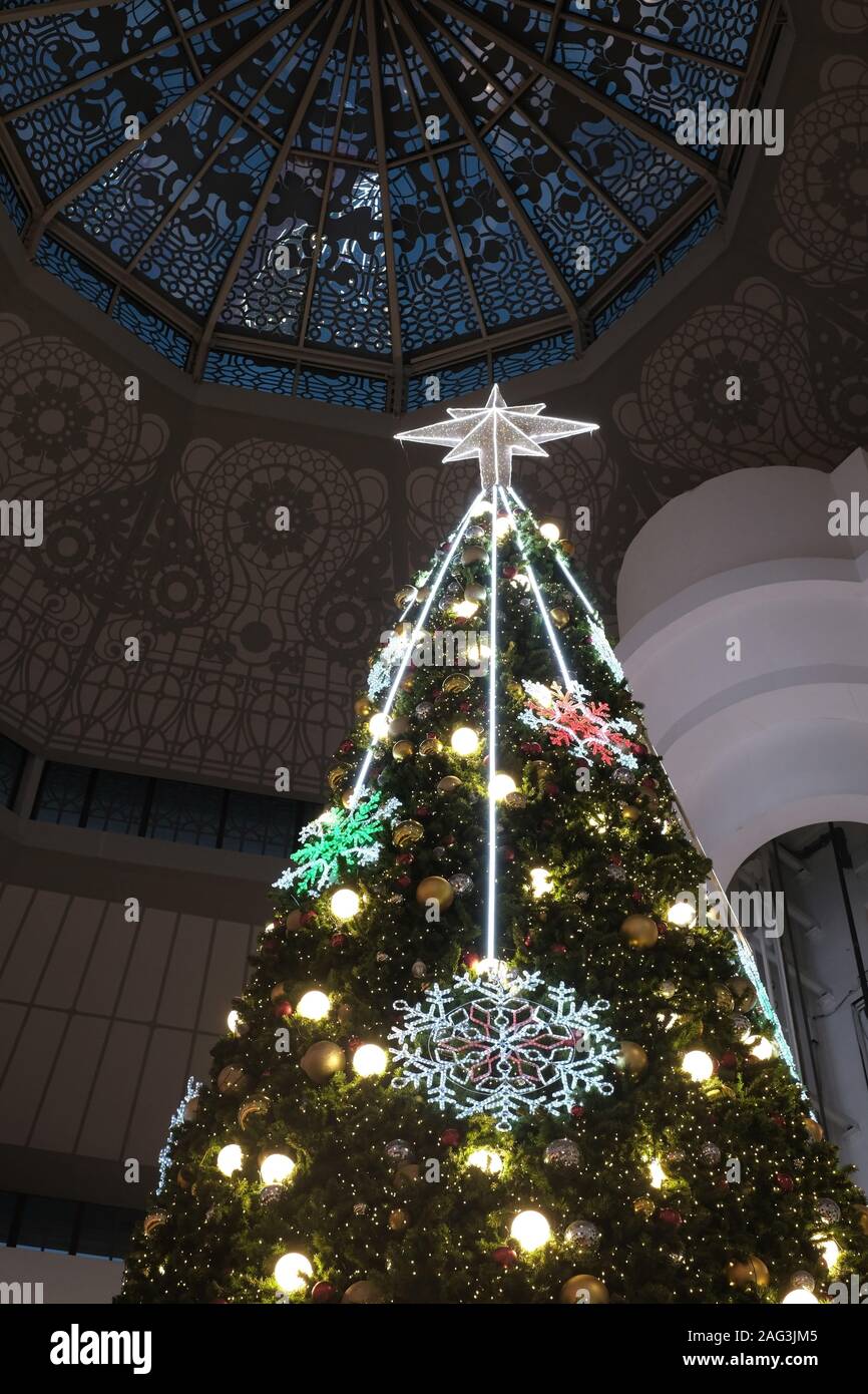 Christmas tree with a silver star on top Stock Photo - Alamy
