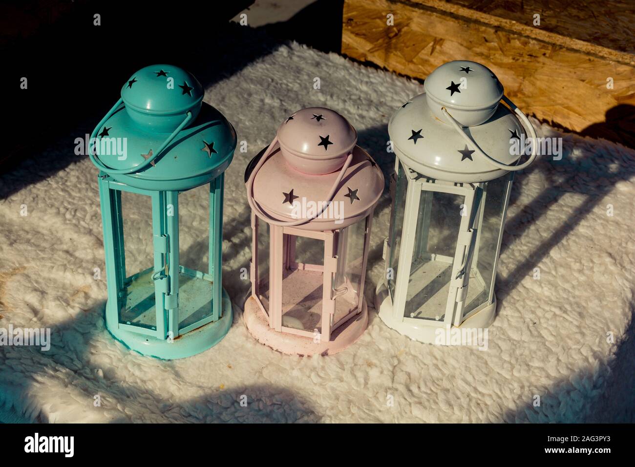 Old retro style lantern made of metal in hand Stock Photo - Alamy
