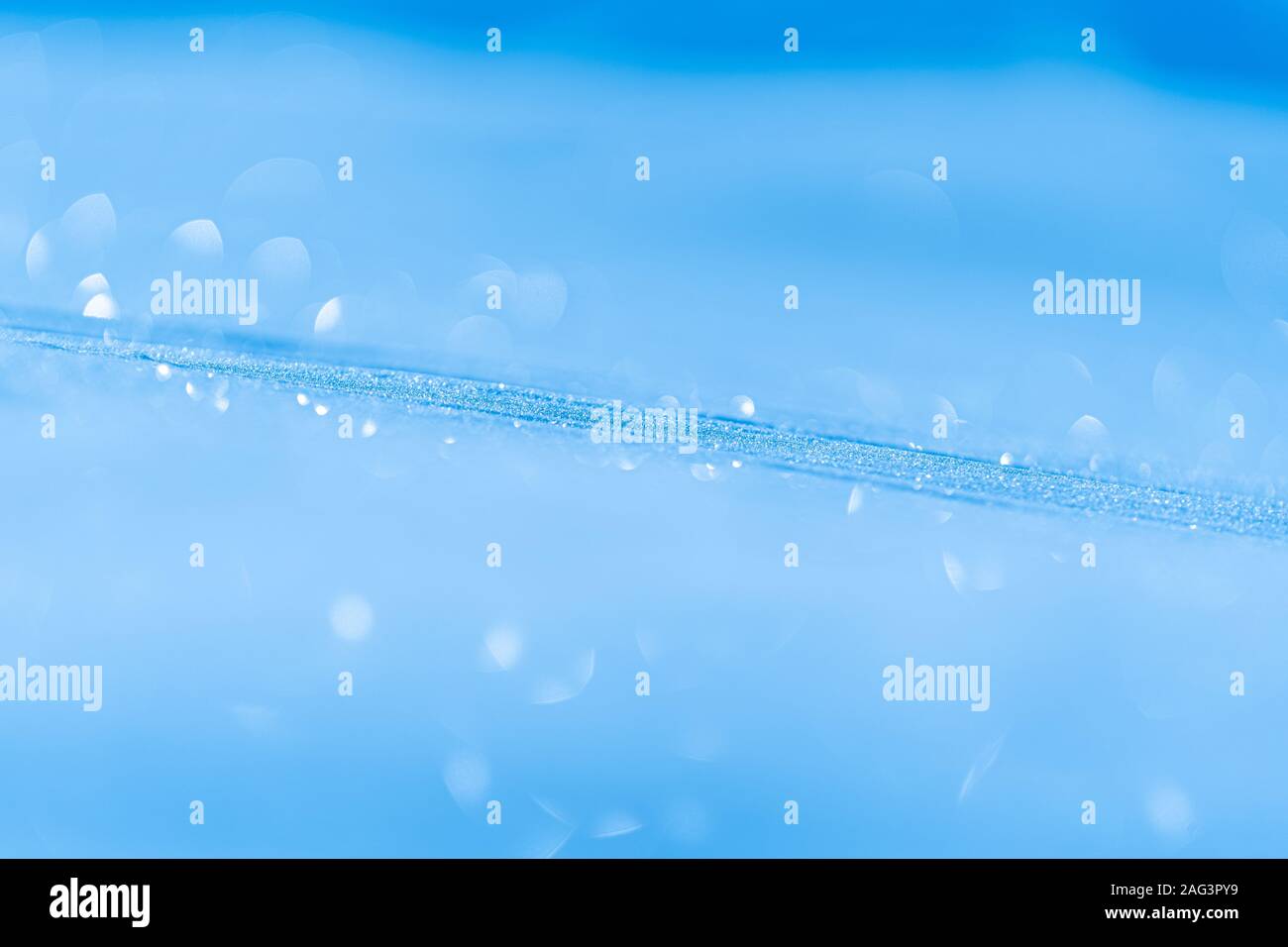 Christmas background of blue snowing with bokeh effect Stock Photo - Alamy