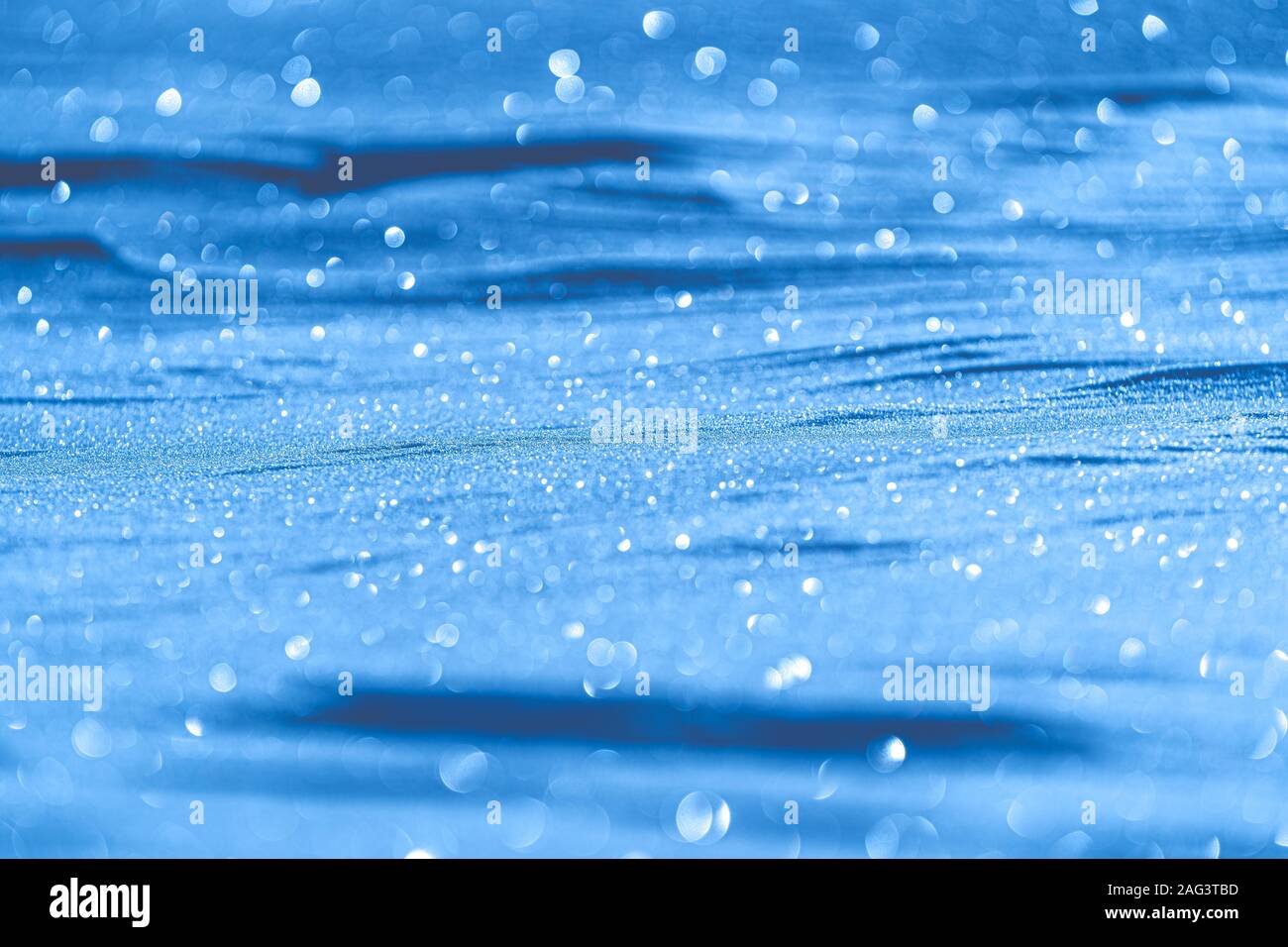 Christmas background of blue snowing with bokeh effect Stock Photo - Alamy