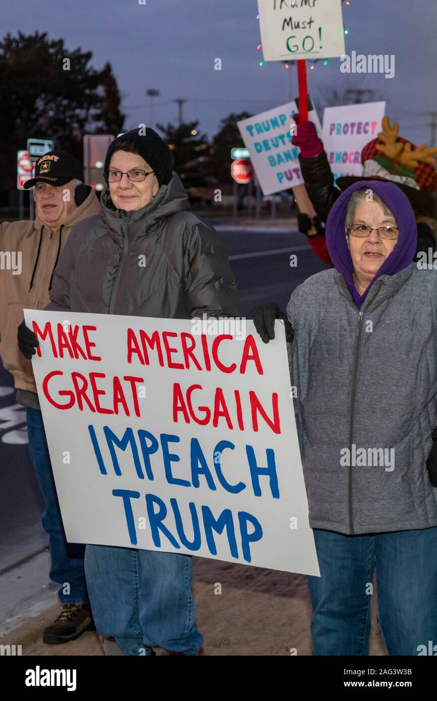 Rochester Hills, Michigan, USA - 17 December 2019 - Several hundred protesters, almost all white, urged the impeachment of President Trump. They were outside the office of Rep. Elissa Slotkin, a Democrat elected in 2018 to represent a district that voted for Trump in 2016. The rally was one of more than 500 pro-impeachment rallies scheduled in all 50 states. Credit: Jim West/Alamy Live News Stock Photo