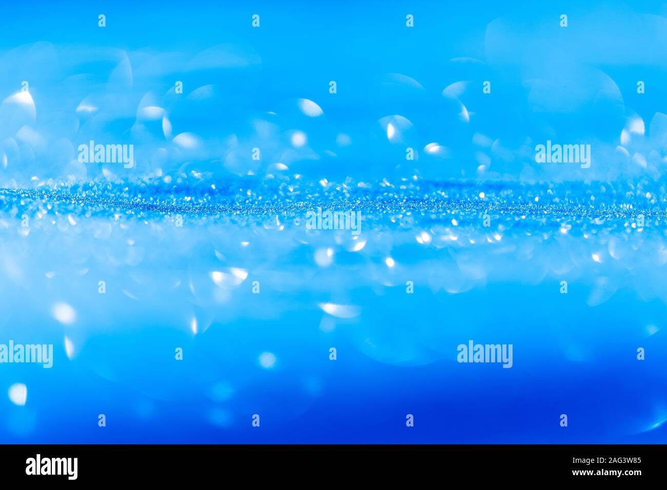 Christmas background of blue snowing with bokeh effect Stock Photo - Alamy
