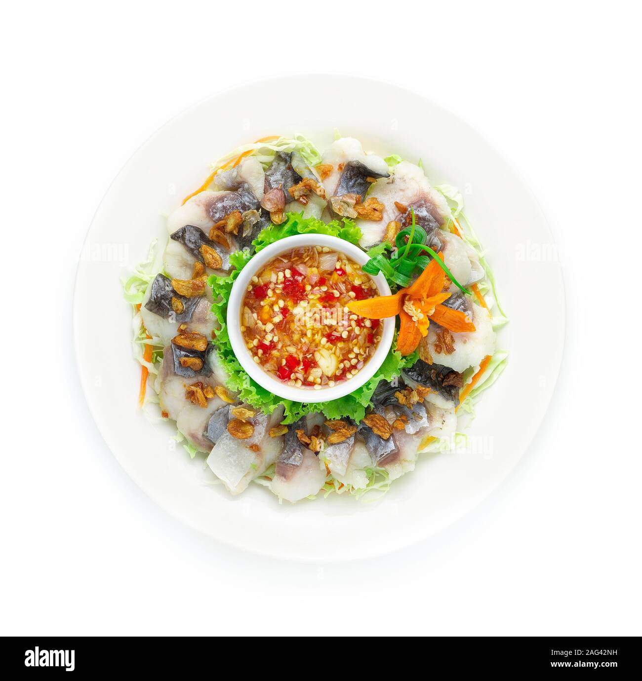 Steamed Pangasius Fish Blanching (Fresh Sea Dolly  Fish Boiled) Topped Crispy Garlic Served with Spicy Seafood sauce Thai Food Style goodtasty decorat Stock Photo