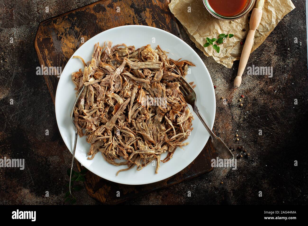 Pulled pork with forks on a plate Stock Photo