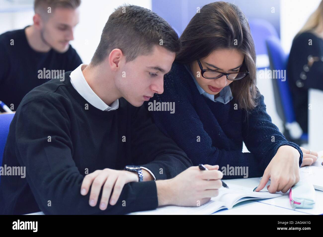 Students during the class. Resolving problems together. Team work ...