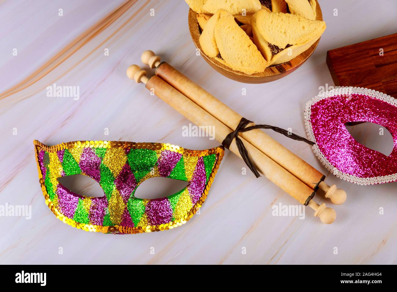 Hamantaschen hamans ears cookies Purim celebration jewish holiday bright party tools and decoration Stock Photo