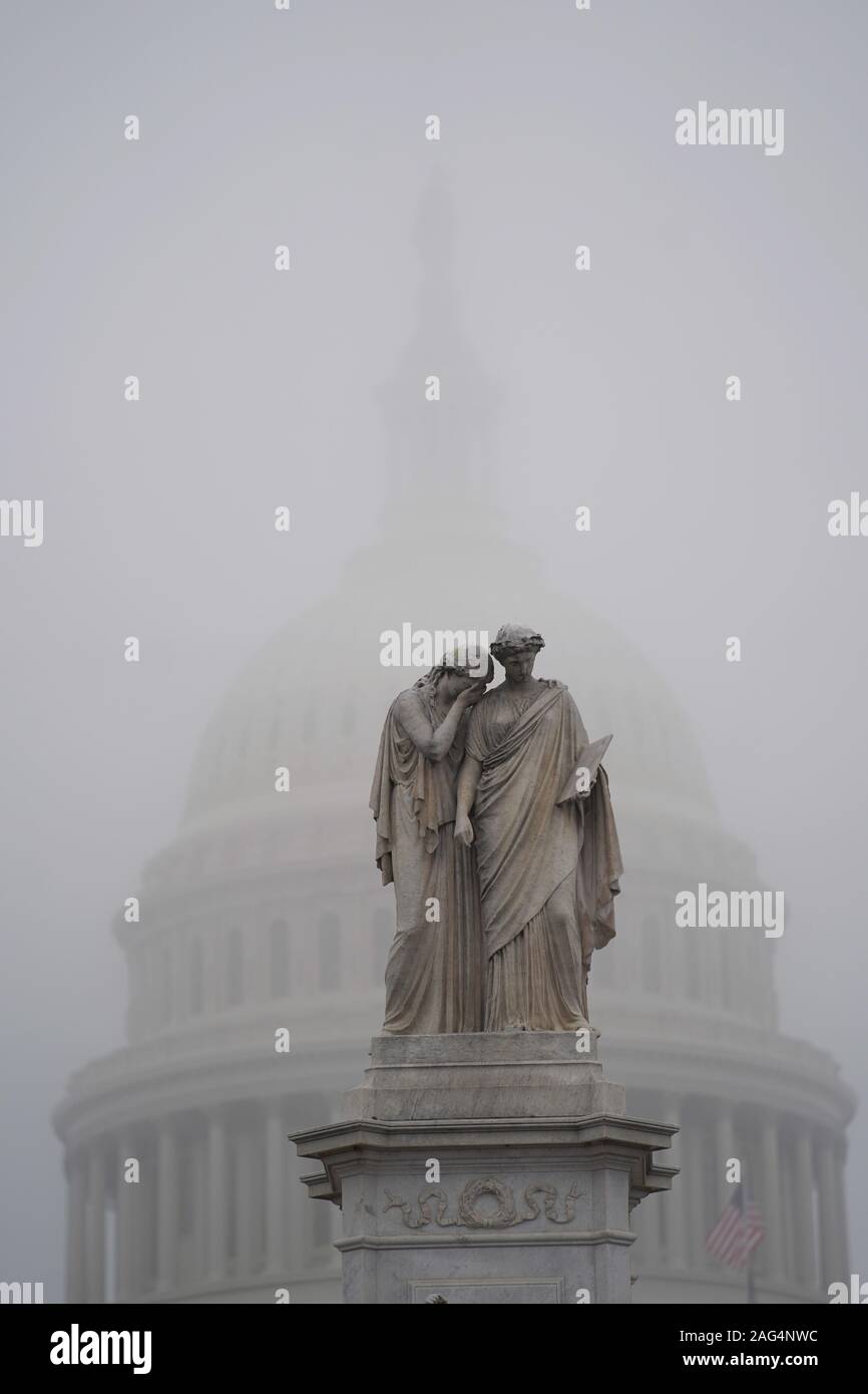 Beijing, USA. 17th Dec, 2019. The Capitol Hill is shrouded in fog in Washington, DC, the United States, on Dec. 17, 2019. U.S. President Donald Trump on Tuesday sent a six-page letter to House Speaker Nancy Pelosi, slamming the House Democrats impeachment effort as an 'illegal, partisan attempted coup' and an 'unprecedented and unconstitutional abuse of power.' Credit: Liu Jie/Xinhua/Alamy Live News Stock Photo