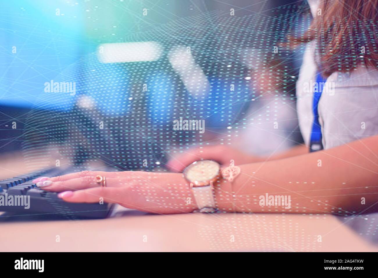 Group of security guards working on computers while sitting in the main ...