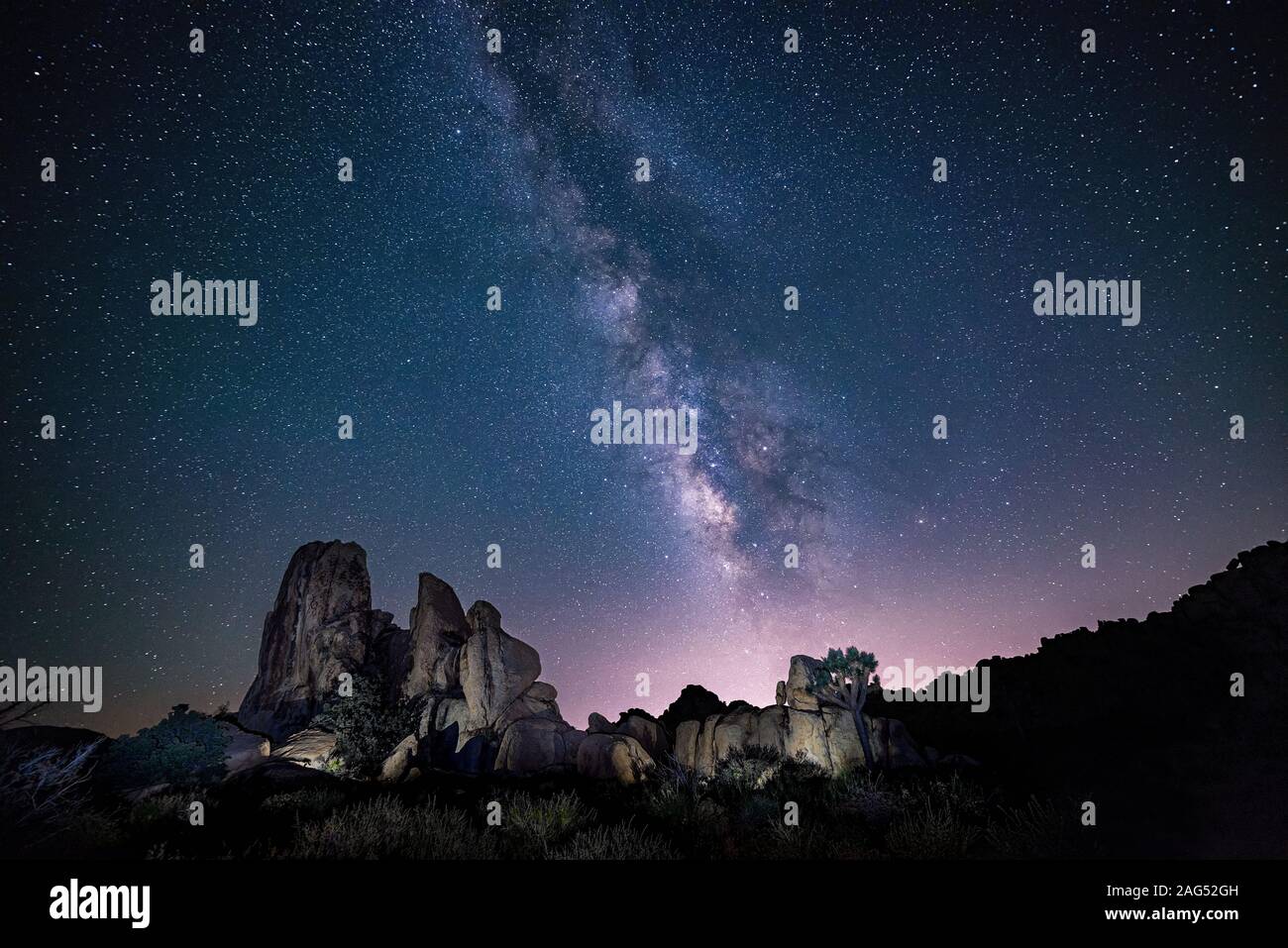 A Beautiful Shot Of Silhouettes Of Rocks Under The Purple Sky Full A Beautiful Shot Of Silhouettes Of Rocks Under The Purple Sky Full