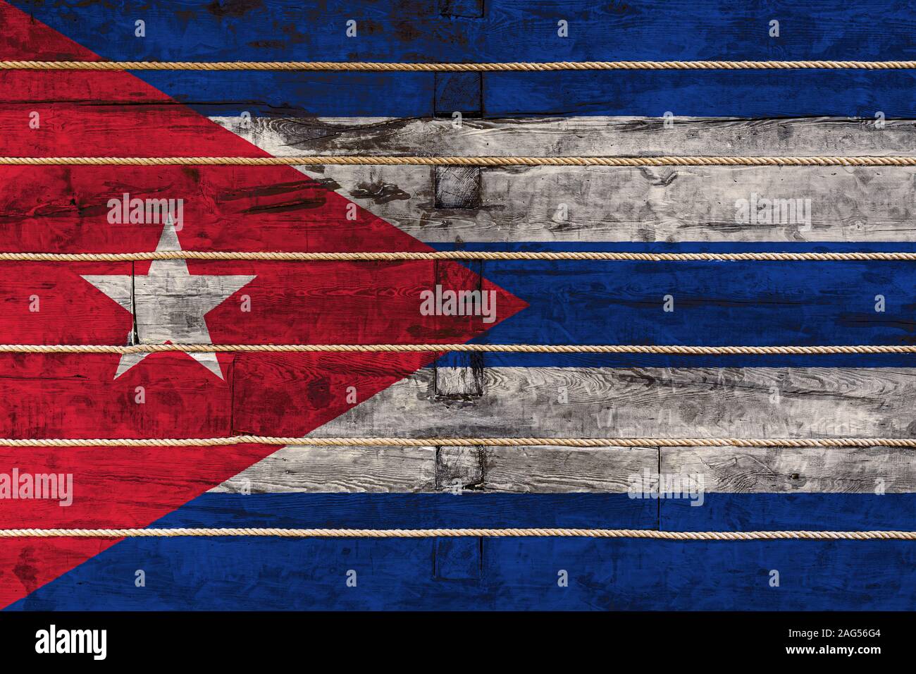 National flag of Cuba on a wooden wall background. The concept of ...