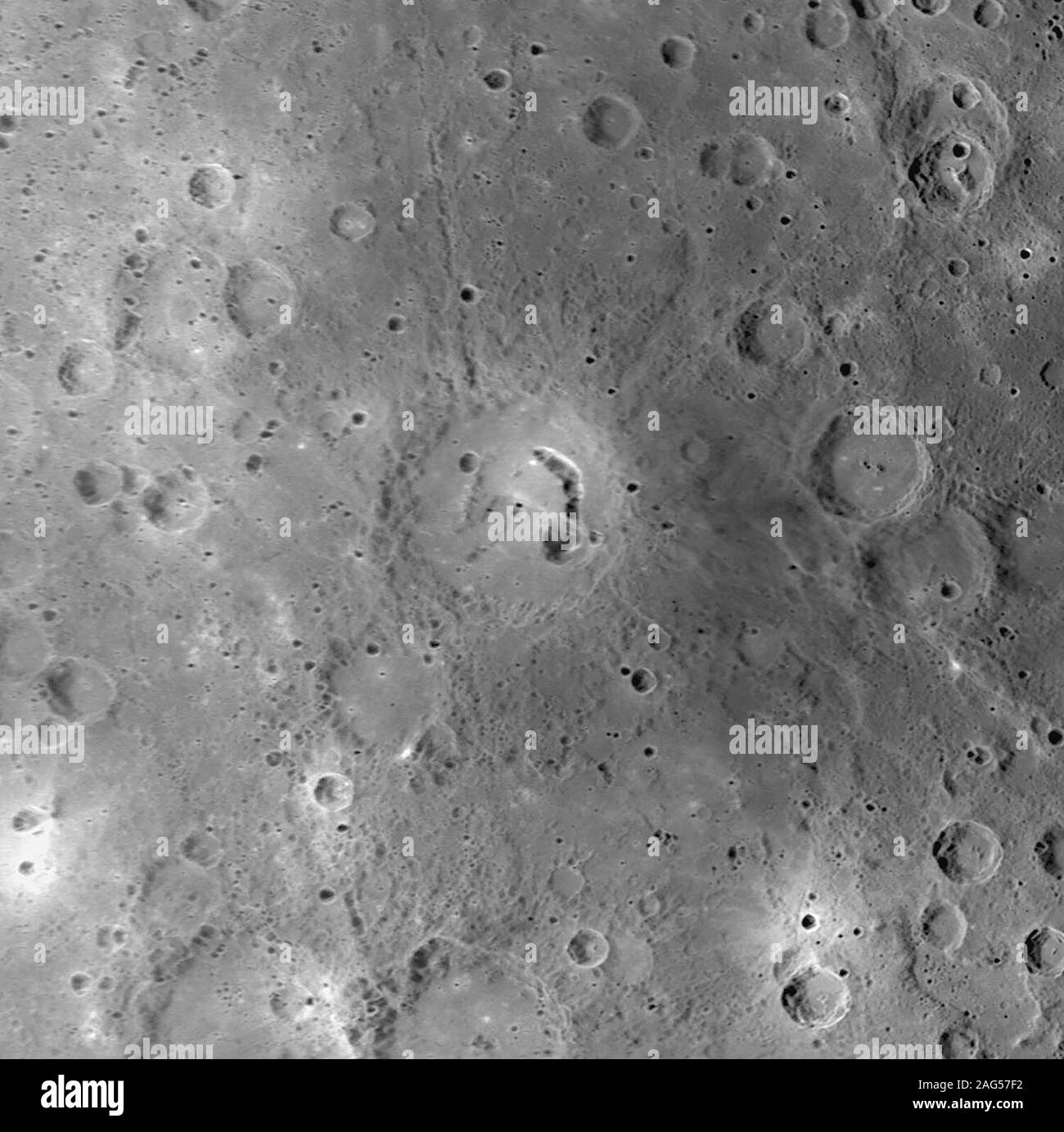 This crater, first imaged during MESSENGER's third Mercury flyby, has drawn scientific attention because of the large, arc-shaped pit located on the eastern side of its floor. Similar pits have been discovered on the floors of several other Mercury craters, such as Beckett and Gibran. These pits are postulated to have formed when subsurface magma subsided or drained, causing the surface to collapse into the resulting void. If this interpretation is correct, pit-floor craters such as Picasso provide evidence of shallow magmatic activity in Mercury's history. Stock Photo