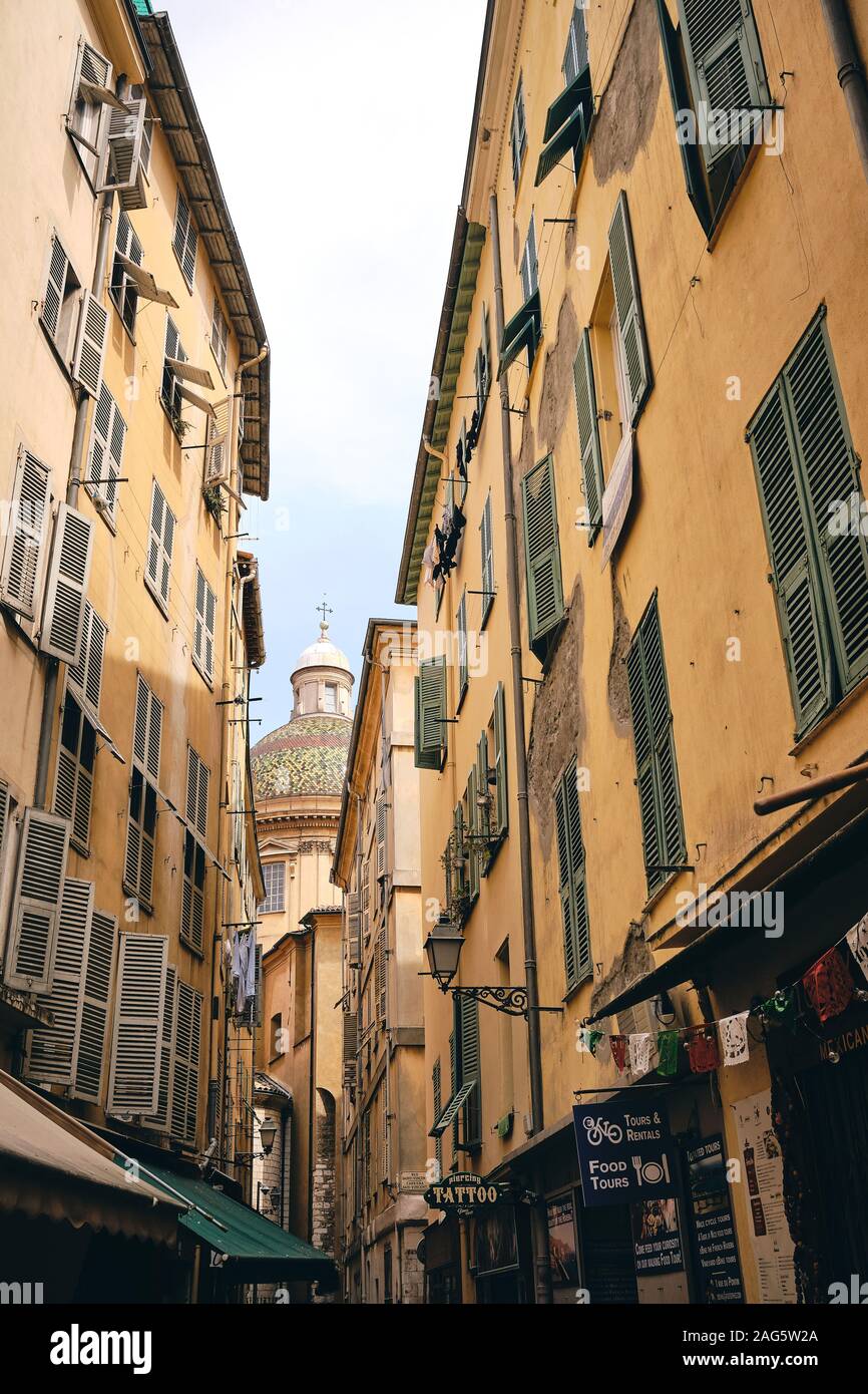 A Vertical Low Angle Shot Of The Beautiful Alley And The Buildings